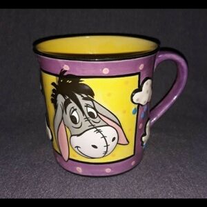 Disney Eeyore Mug with Purple and Yellow Design